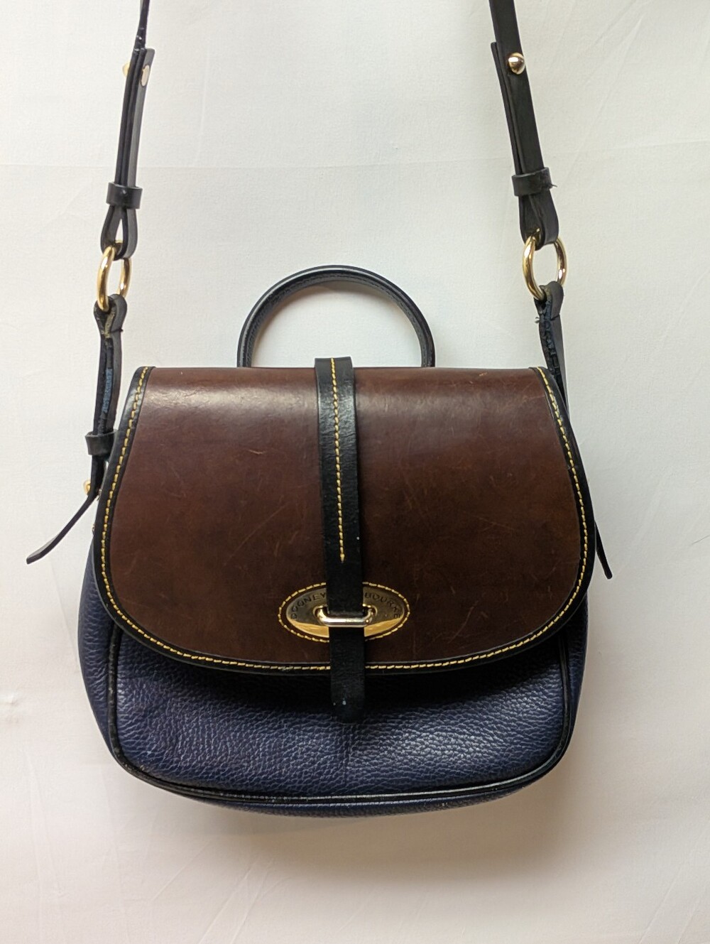 Dooney & Bourke All Weather Flap Saddle Bag